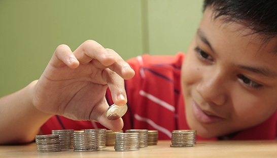 NIBC medewerkers leren kinderen omgaan met geld